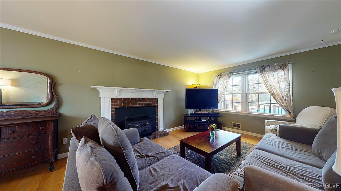 1863 Butztown Road Bethlehem, PA 18017 - Photo 4 of 48 Spacious living room with wood burning fireplace i