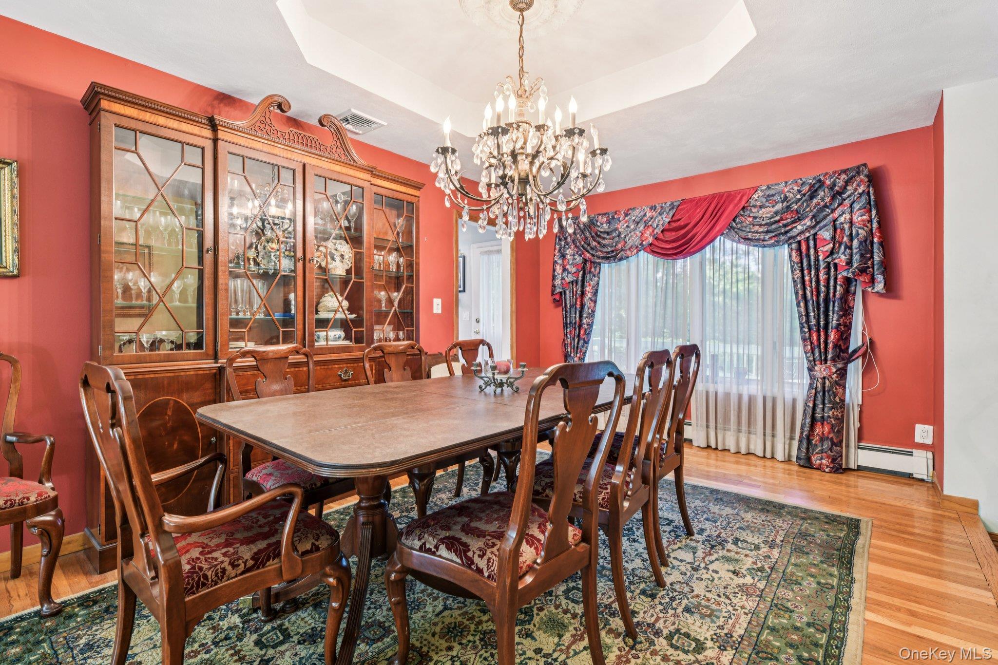 22 Reynolds Road Glen Cove, NY 11542 - Photo 7 of 22 a view of a dining room with furniture window and wooden floor