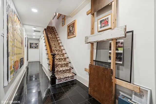 a view of an entryway with wooden floor