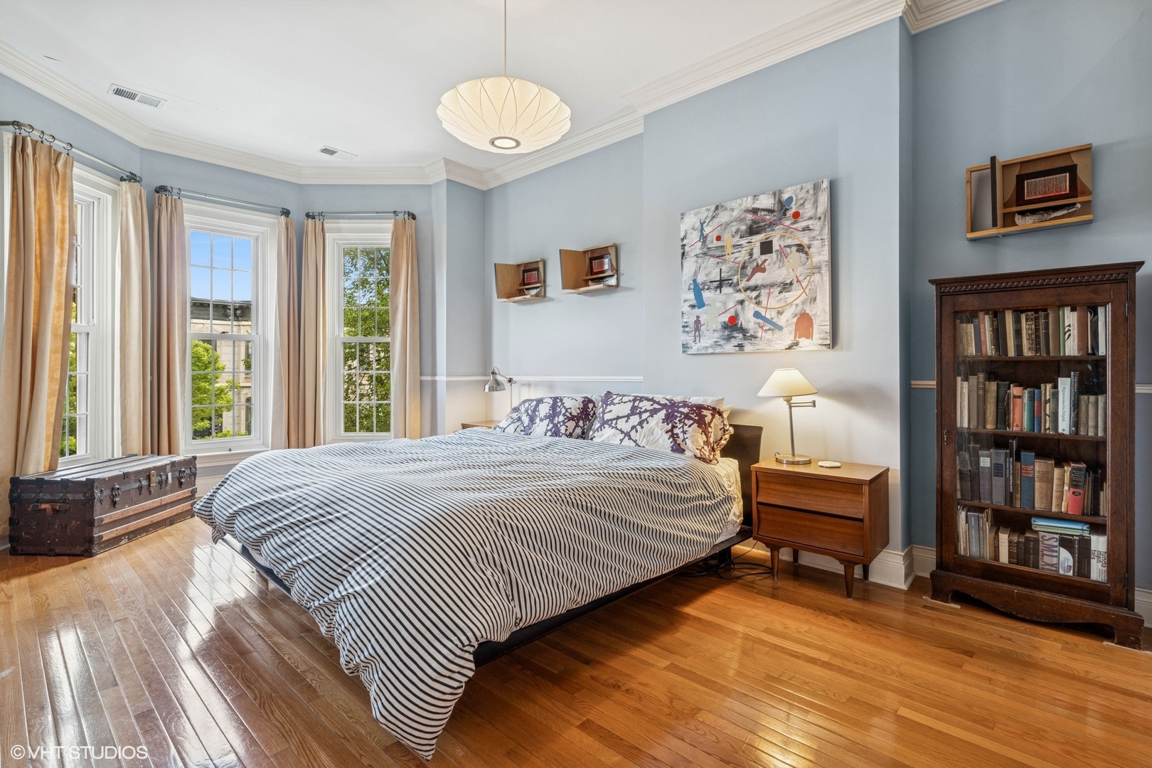 2249 West Warren Boulevard Chicago, IL 60612 - Photo 13 of 25 a bedroom with a bed and a large window