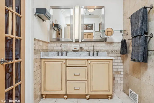 a bathroom with a sink and a mirror