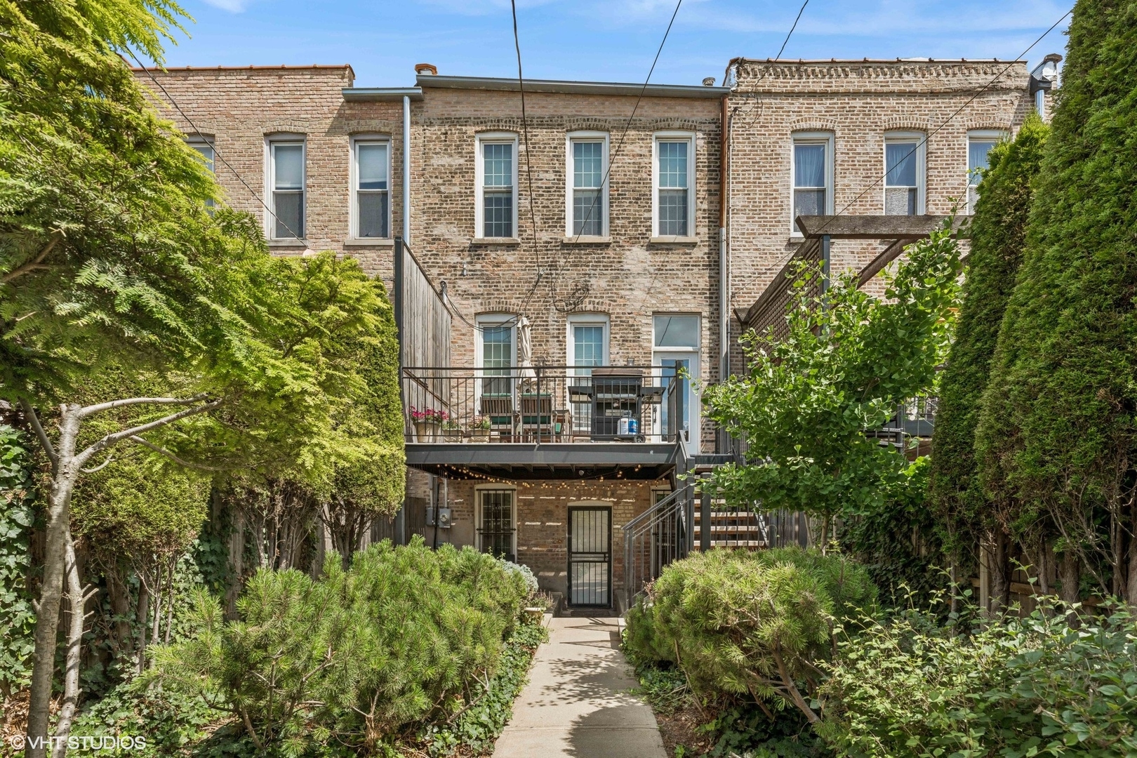 2249 West Warren Boulevard Chicago, IL 60612 - Photo 24 of 25 a view of a brick house with windows