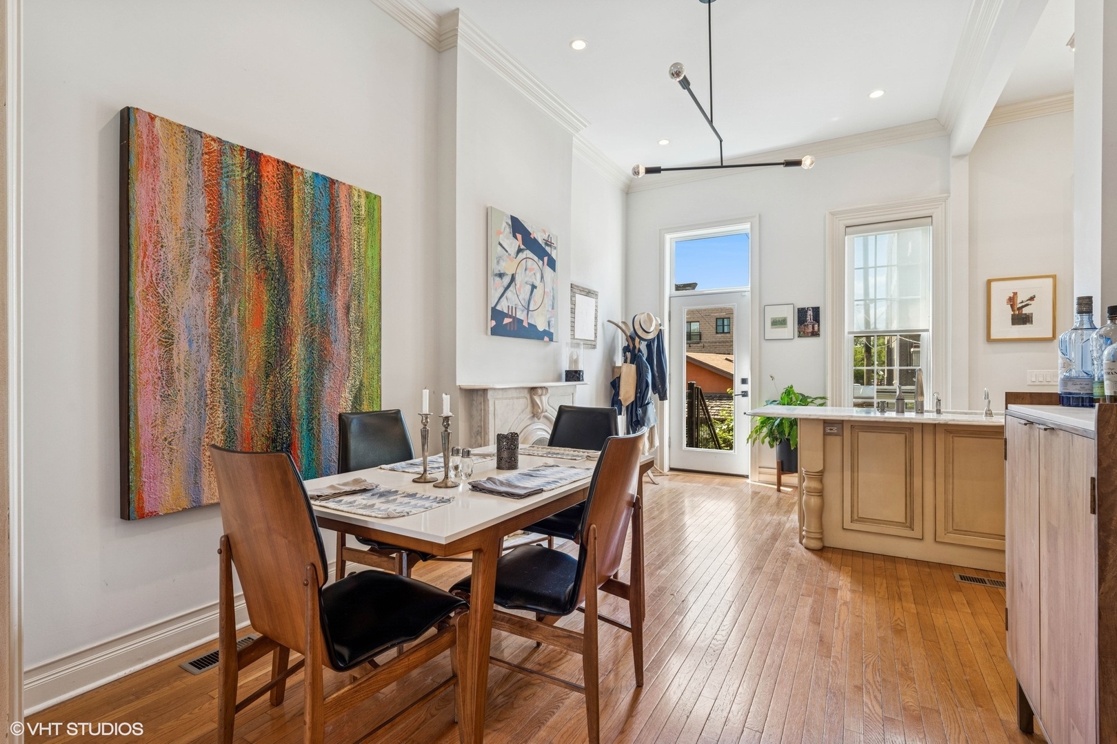 2249 West Warren Boulevard Chicago, IL 60612 - Photo 9 of 25 a view of a dining room with furniture and wooden floor