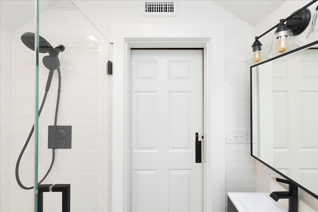 37 Wolcott Road Brookline, MA 02467 - Photo 27 of 41 a bathroom with a shower