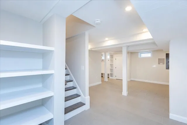 a view of a hallway with staircase