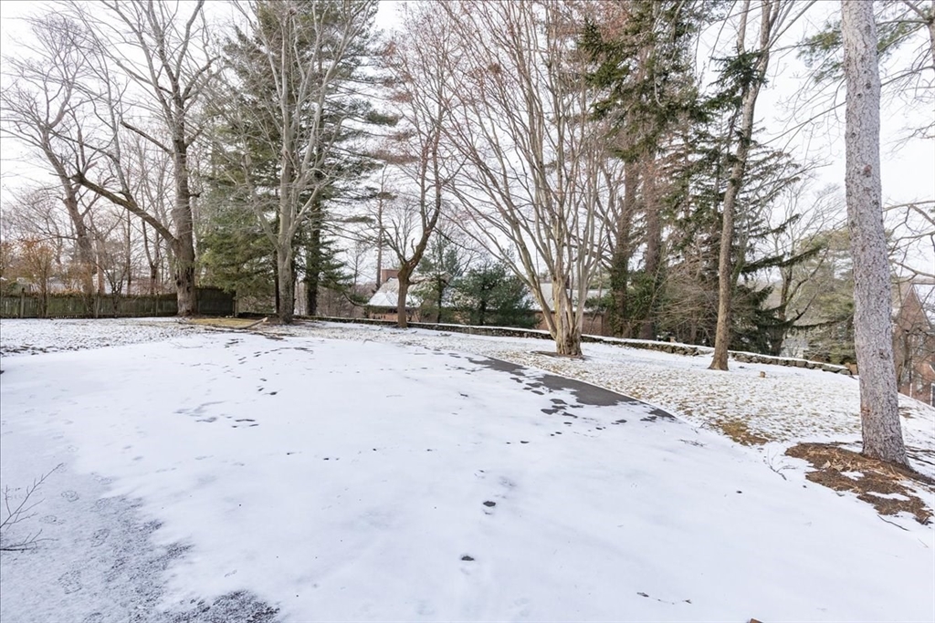 37 Wolcott Road Brookline, MA 02467 - Photo 38 of 41 a view of empty space with snow on the road