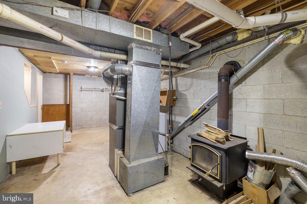 3240 Halter Road Westminster, MD 21158 - Photo 59 of 85 Basement woodstove for additional heat source!