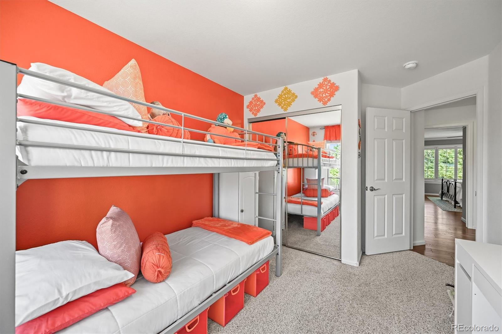 6242 Shea Place Highlands Ranch, CO 80130 - Photo 25 of 45 a living room with baby crib furniture and a window