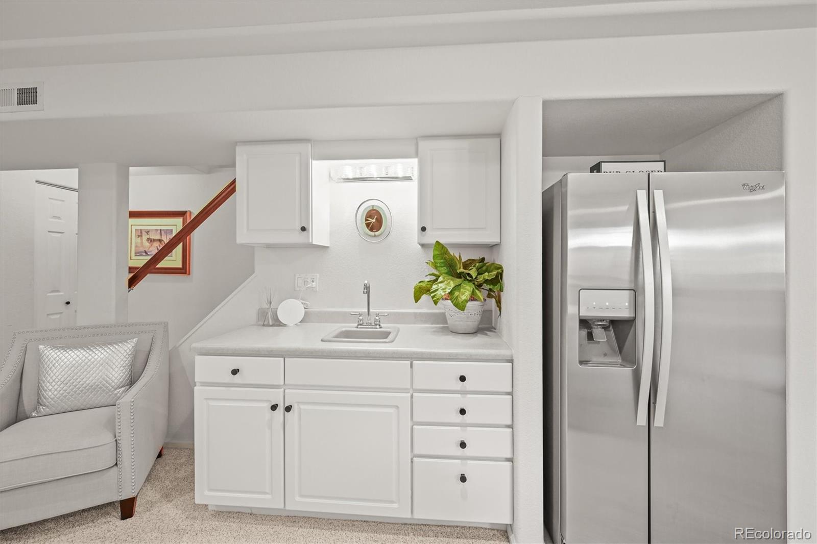 6242 Shea Place Highlands Ranch, CO 80130 - Photo 36 of 45 a bathroom with a sink and a mirror
