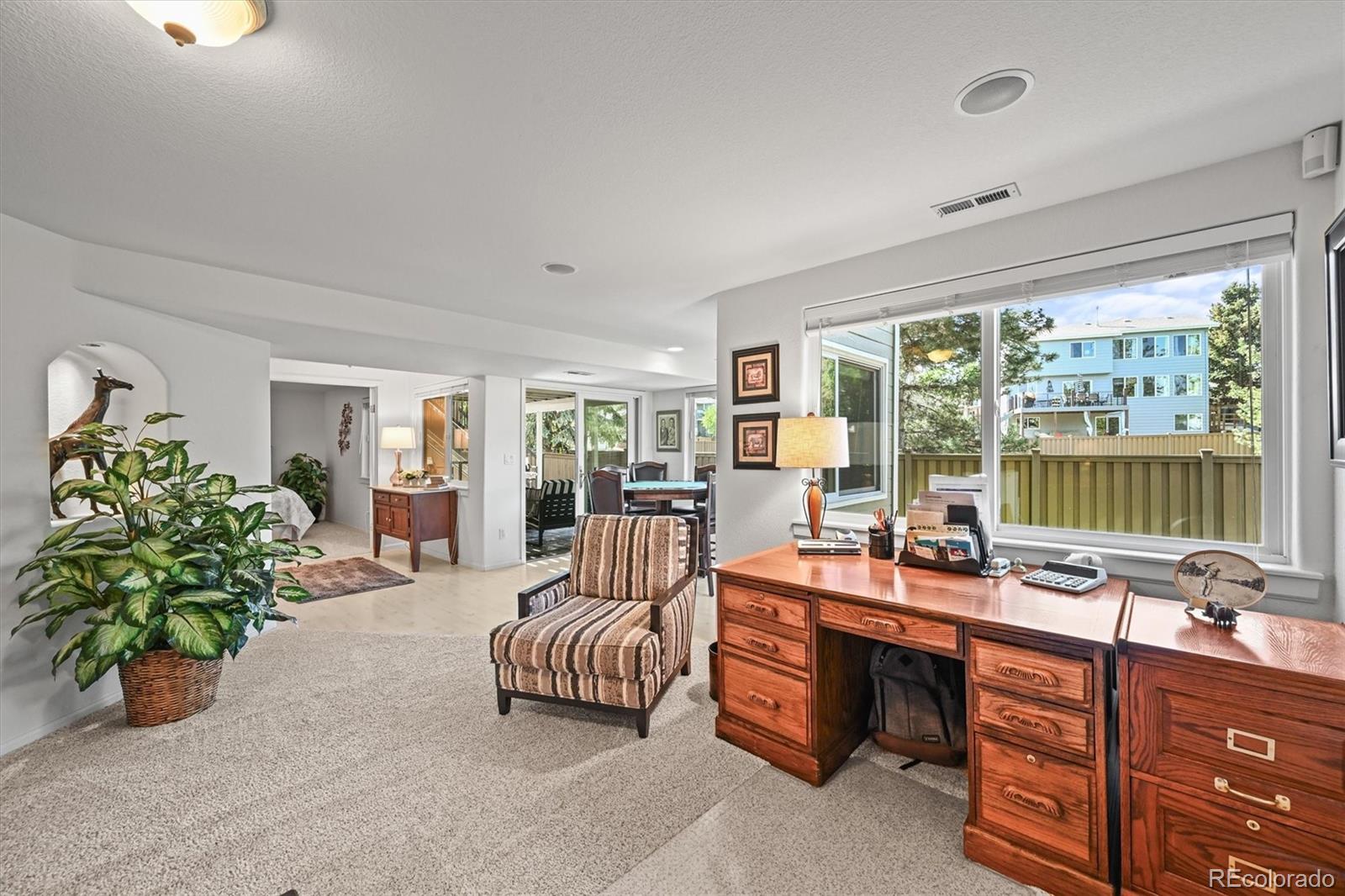 6242 Shea Place Highlands Ranch, CO 80130 - Photo 37 of 45 a room with furniture and a large window