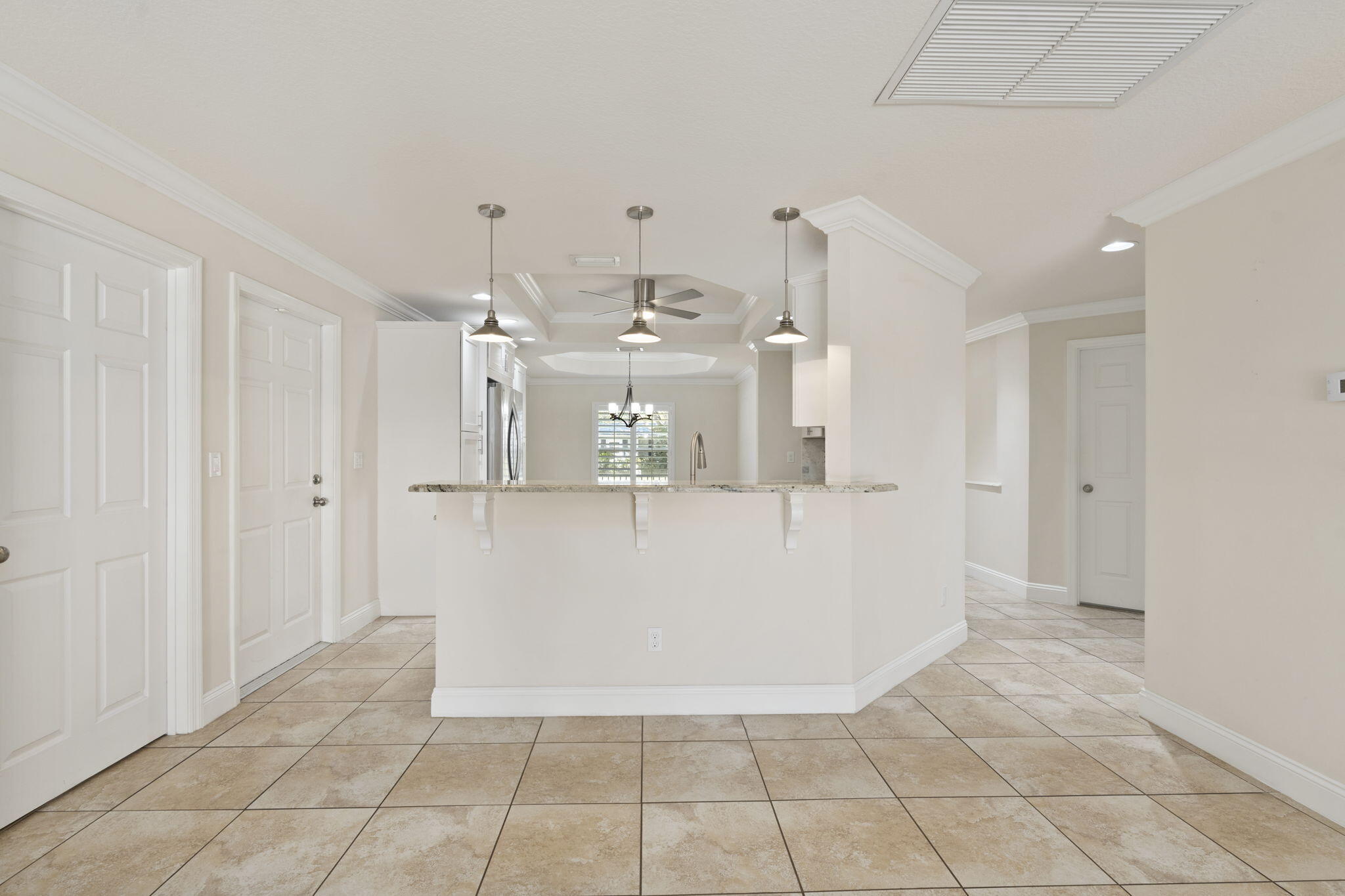 339 Southwest Winnachee Drive Stuart, FL 34994 - Photo 14 of 52 a view of a living room with kitchen