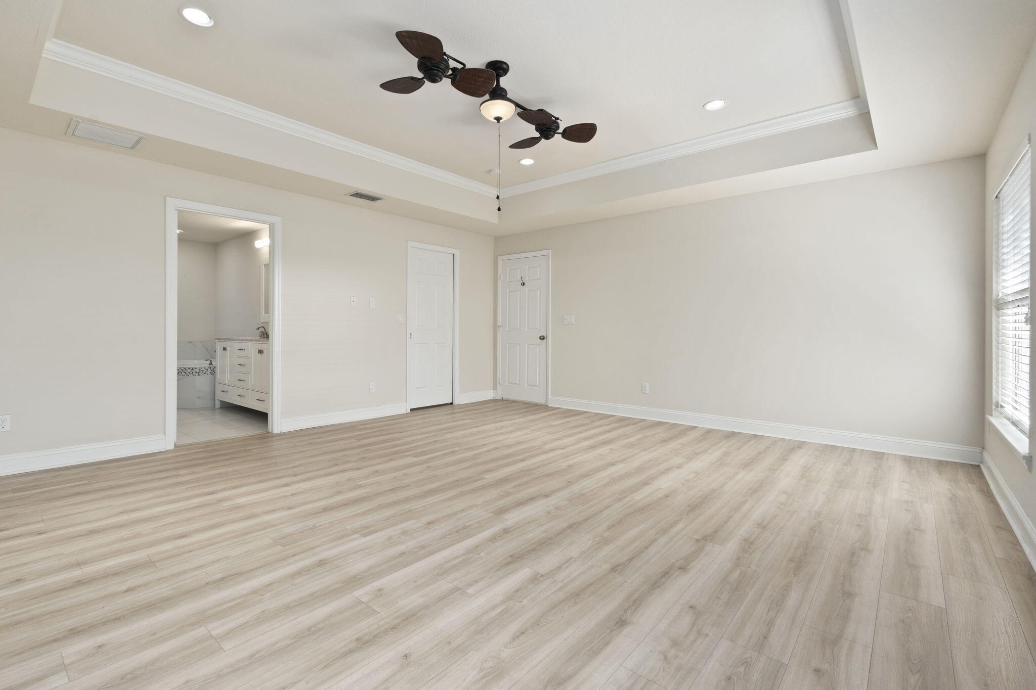 339 Southwest Winnachee Drive Stuart, FL 34994 - Photo 20 of 52 a view of empty room with wooden floor