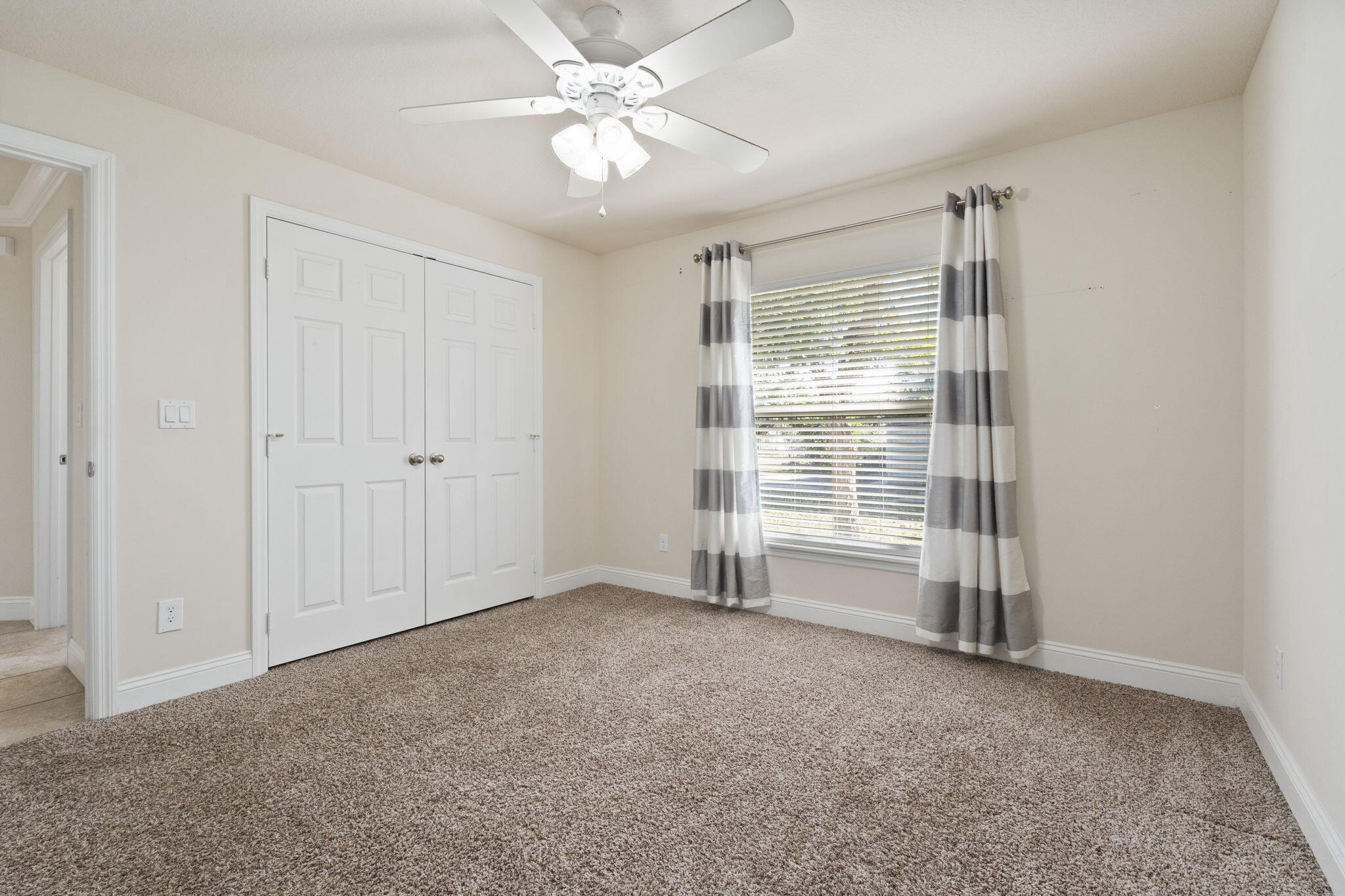 339 Southwest Winnachee Drive Stuart, FL 34994 - Photo 29 of 52 a view of an empty room with a window