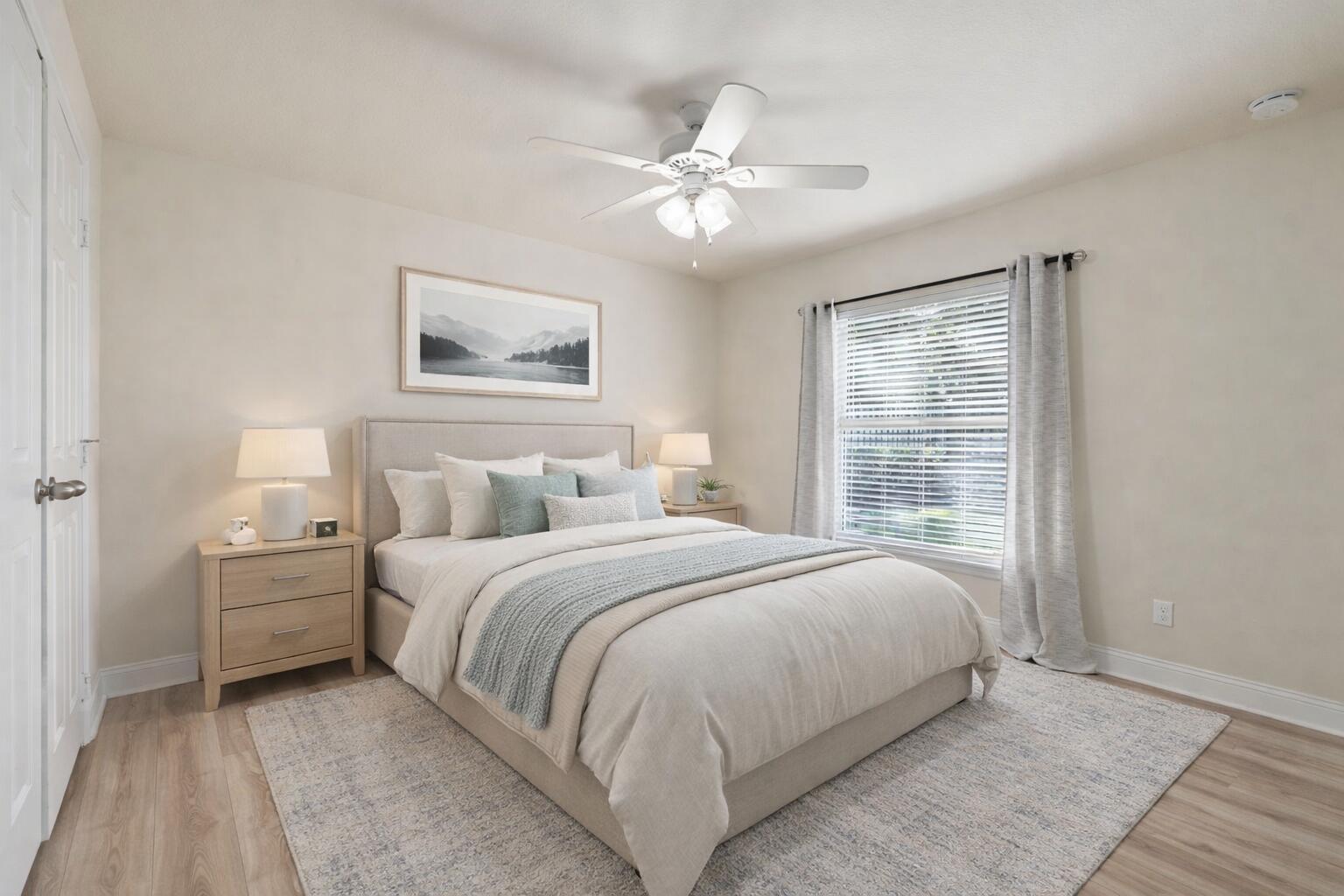 339 Southwest Winnachee Drive Stuart, FL 34994 - Photo 32 of 52 a bedroom with a large bed and a window
