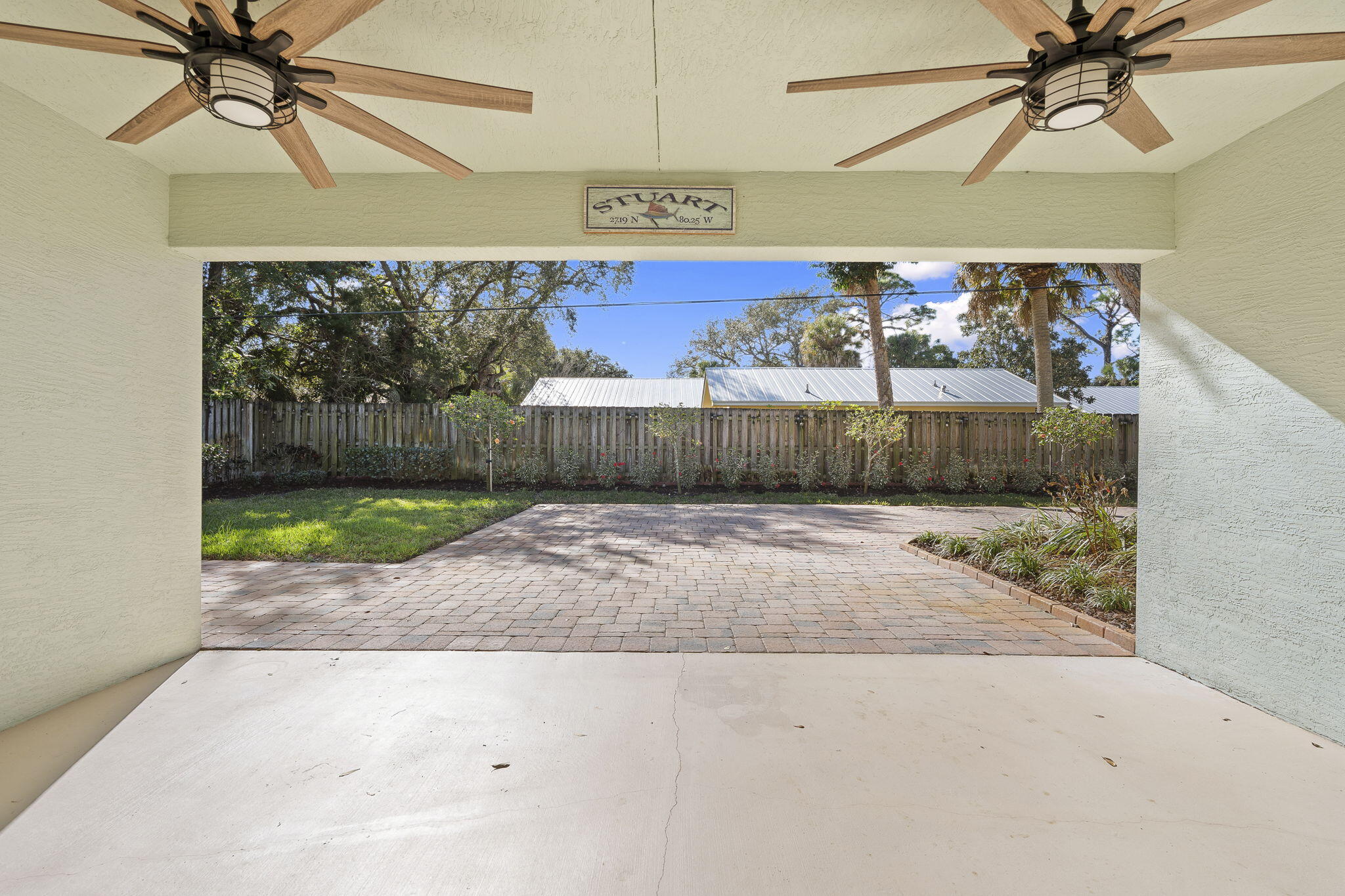 339 Southwest Winnachee Drive Stuart, FL 34994 - Photo 36 of 52 a view of a garage with a window