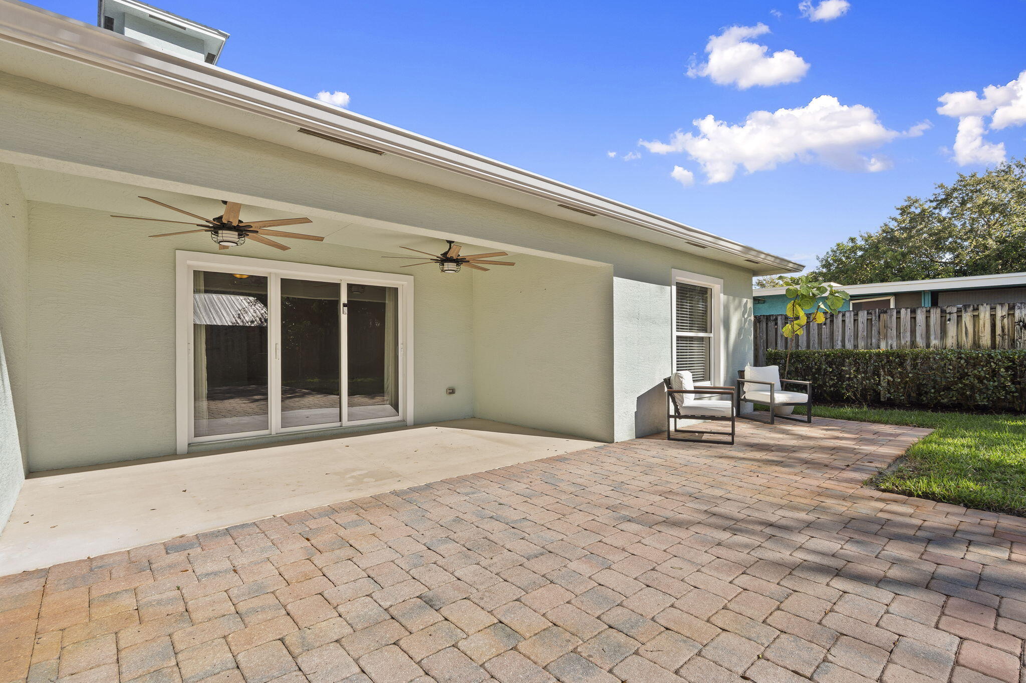 339 Southwest Winnachee Drive Stuart, FL 34994 - Photo 37 of 52 a view of a house with backyard and sitting area