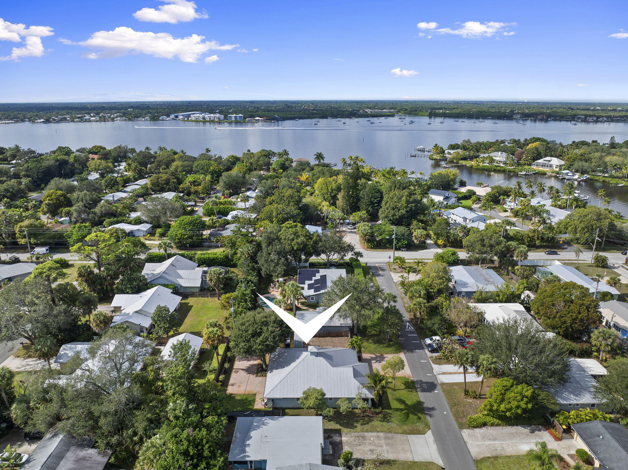 339 Southwest Winnachee Drive Stuart, FL 34994 - Photo 47 of 52 an aerial view of multiple house