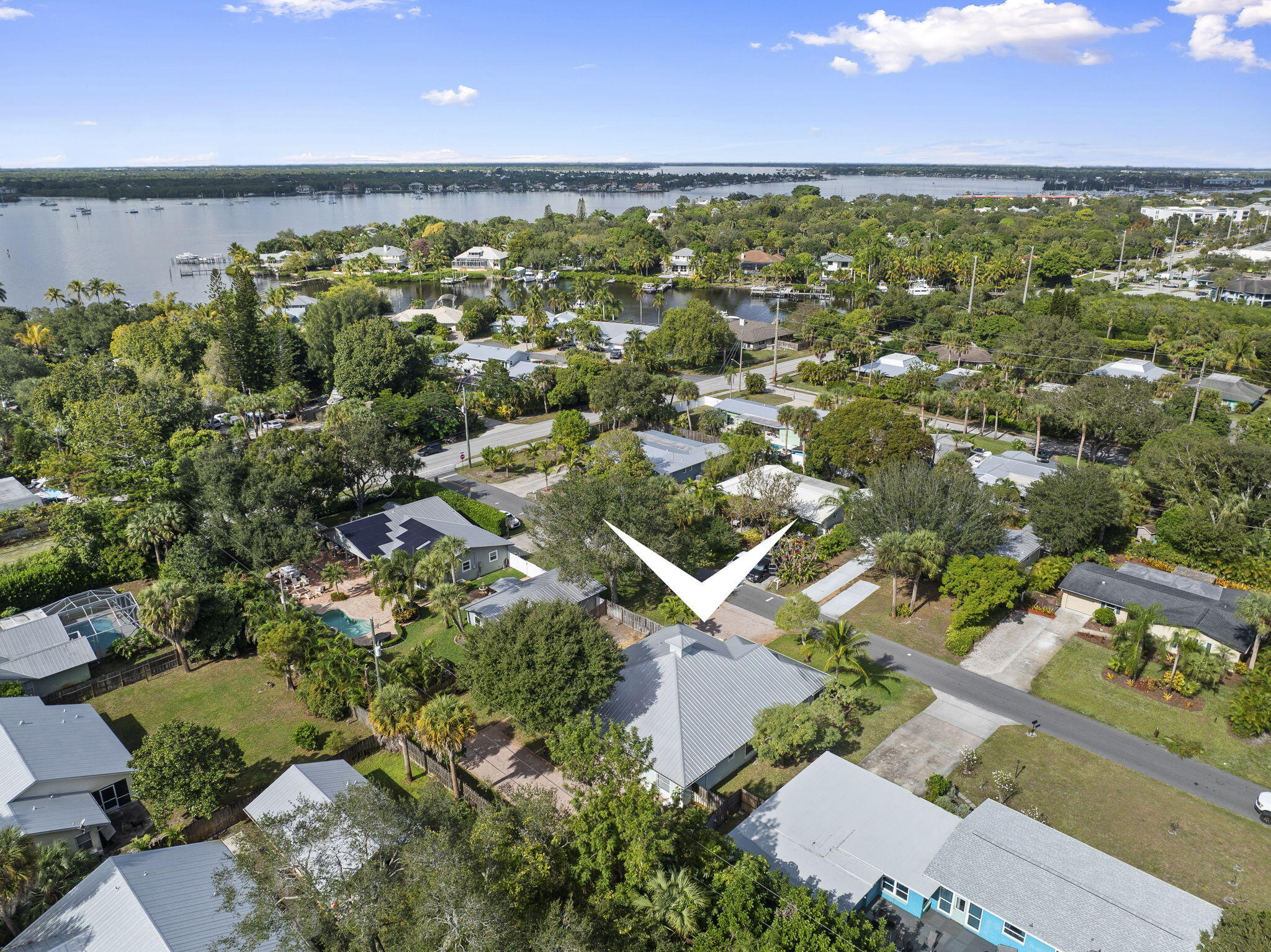 339 Southwest Winnachee Drive Stuart, FL 34994 - Photo 48 of 52 an aerial view of a residential houses with outdoor space and street view