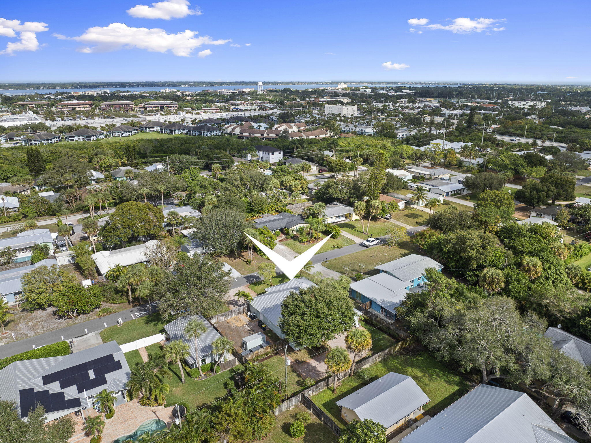 339 Southwest Winnachee Drive Stuart, FL 34994 - Photo 49 of 52 an aerial view of residential houses with outdoor space