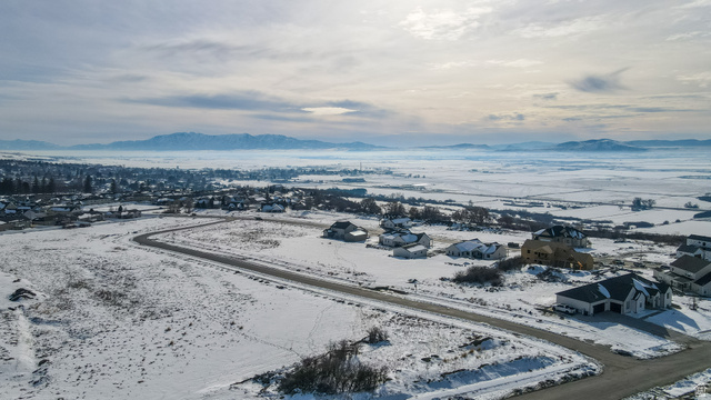 681 Cherry Ridge Lane, Unit 45 Richmond, UT 84333 - Photo 5 of 10 Snowy aerial view featuring a residential view and a mountain view