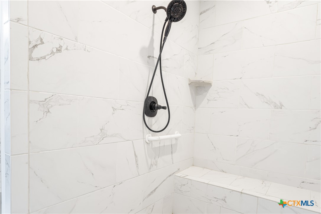 790 Spanish Grant Road Goliad, TX 77963 - Photo 20 of 41 a bathroom with a shower