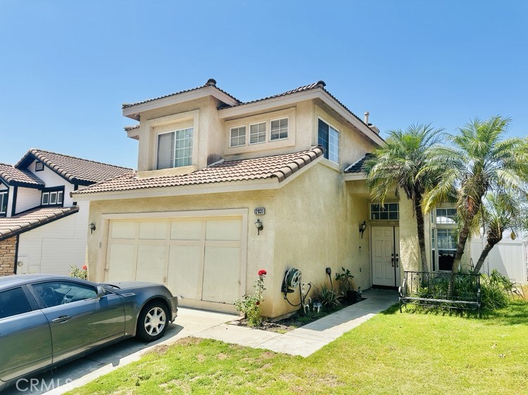 12031 East Sun Canyon Street Riverside, CA 92503 - Photo 2 of 3 a view of a house with backyard and sitting area