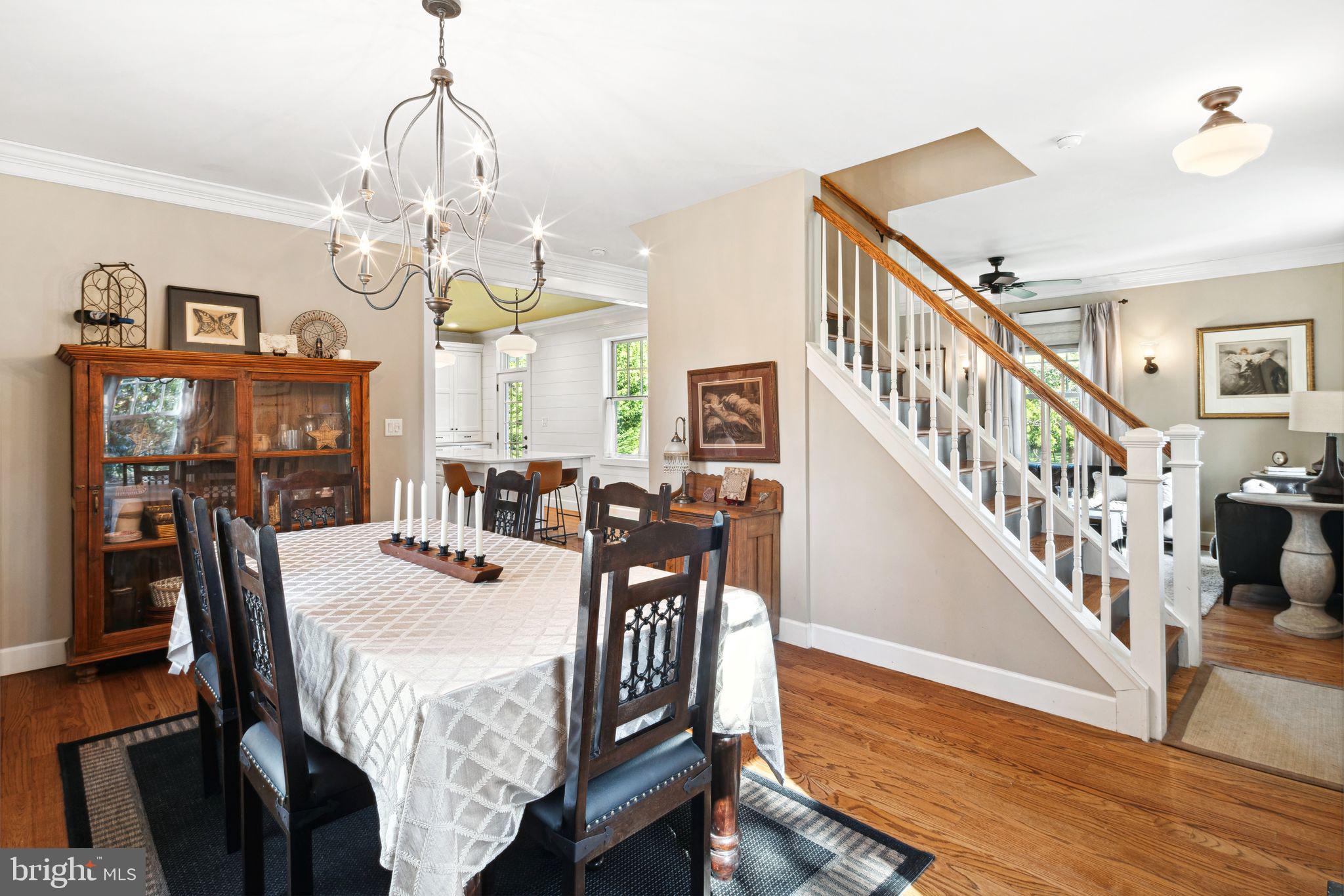 439 Crescent Road Wyncote, PA 19095 - Photo 14 of 31 a view of a dining room with furniture a chandelier and wooden floor