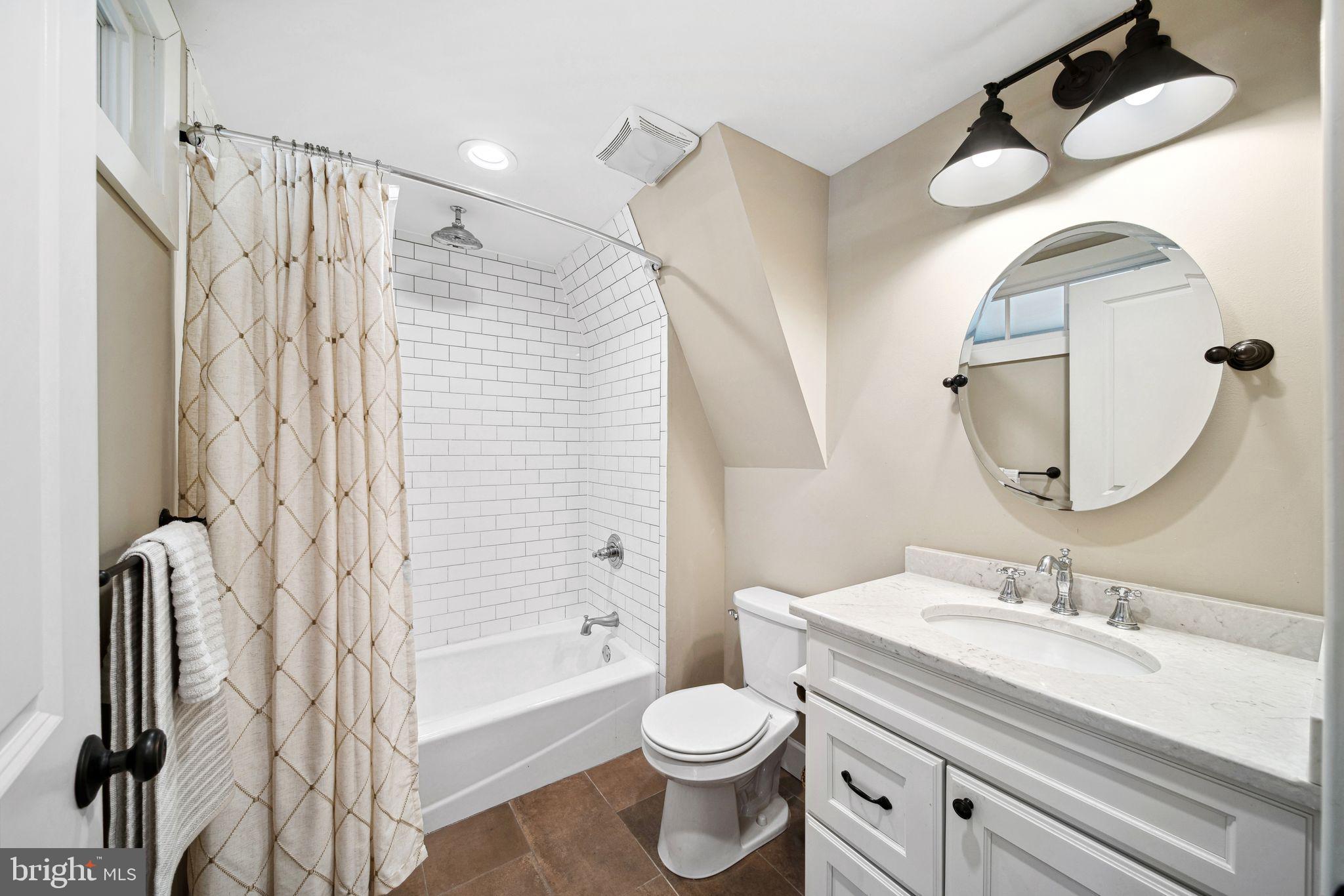 439 Crescent Road Wyncote, PA 19095 - Photo 24 of 31 a bathroom with a granite countertop sink toilet and shower