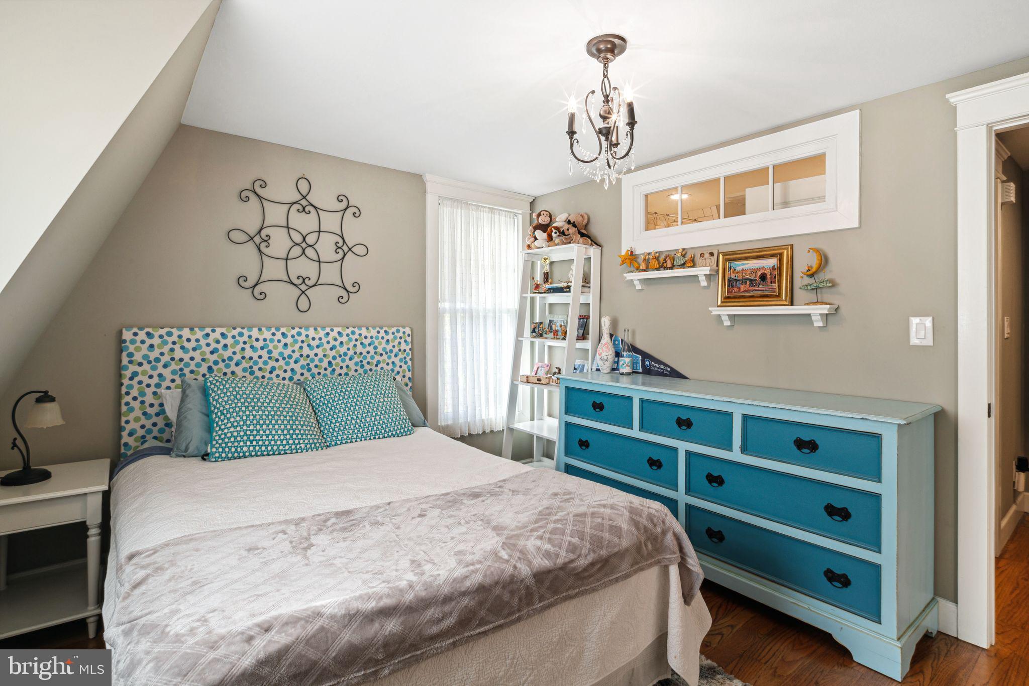 439 Crescent Road Wyncote, PA 19095 - Photo 26 of 31 a bedroom with a bed and a dresser