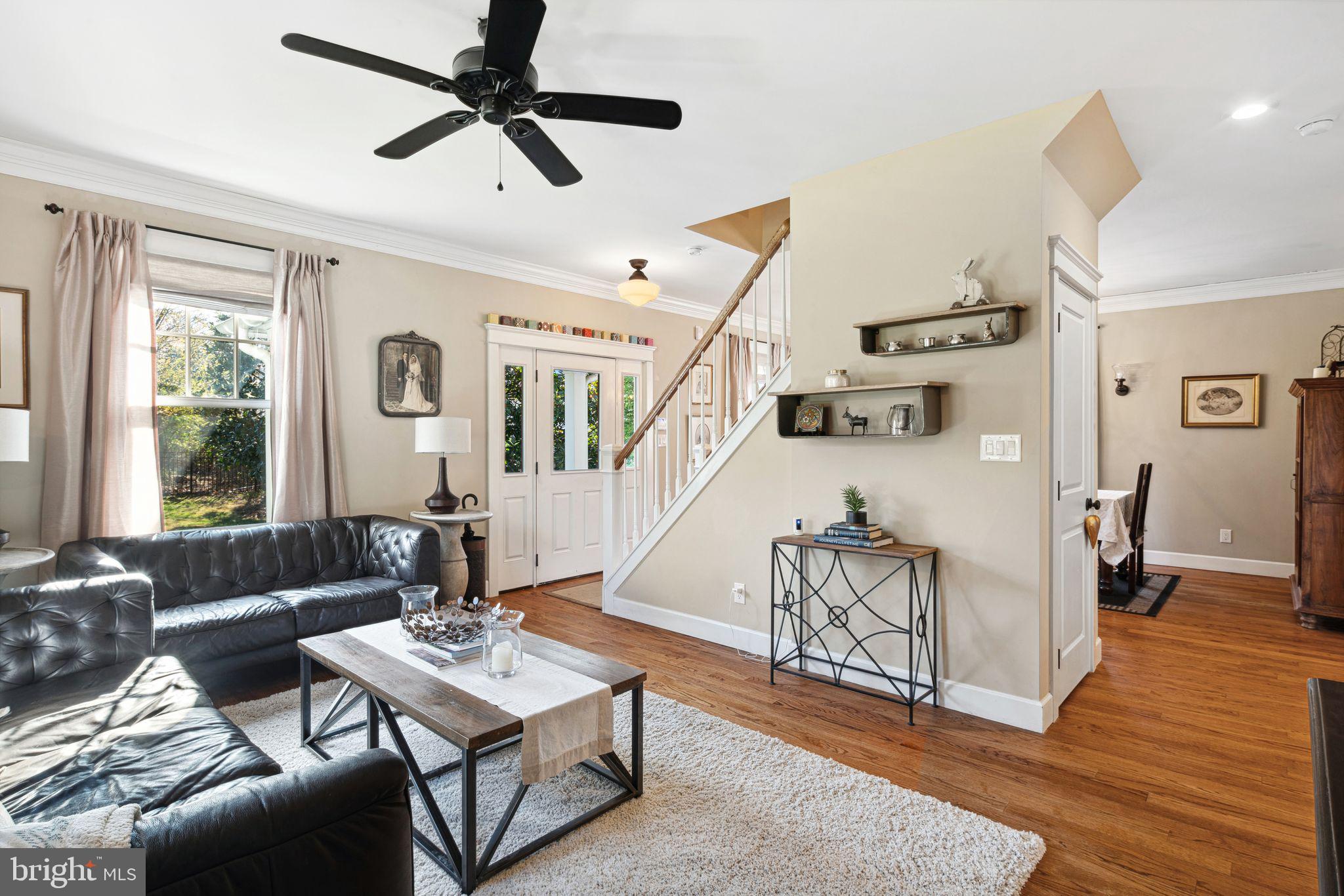 439 Crescent Road Wyncote, PA 19095 - Photo 7 of 31 a living room with furniture and a wooden floor