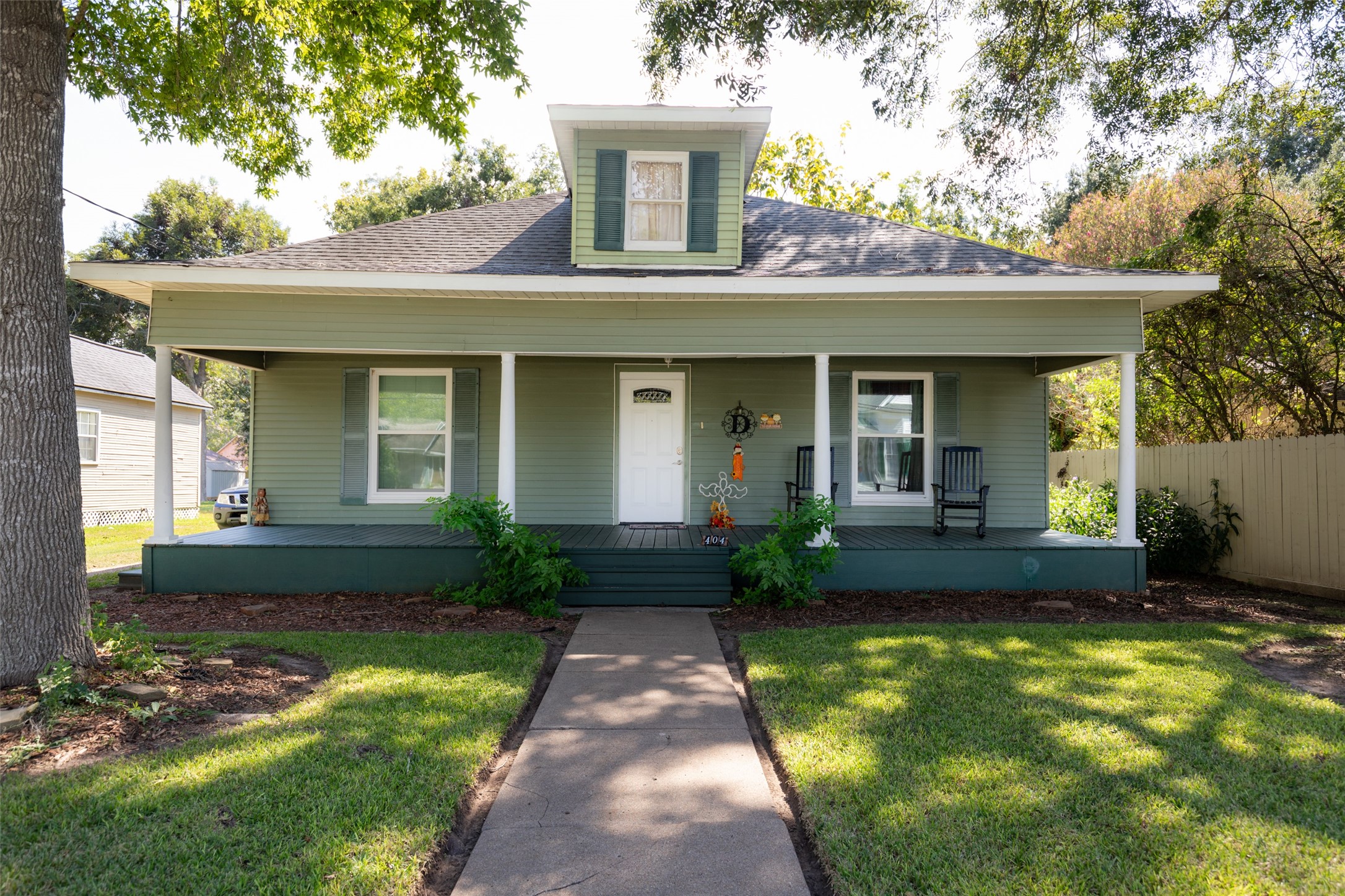 a view of a house with garden