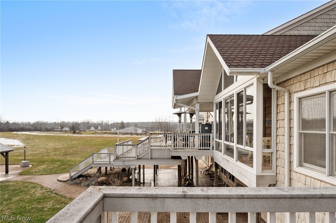 9419 Robinson Road Chardon, OH 44024 - Photo 42 of 46 Wooden deck featuring stairway and a yard