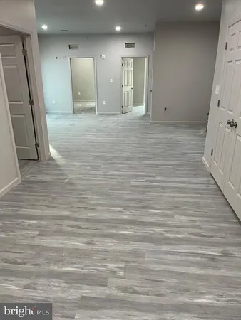 a view of a hallway with closet