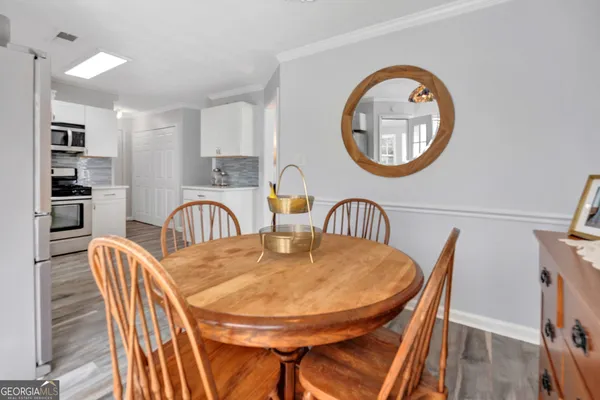 a dining room with furniture and a table