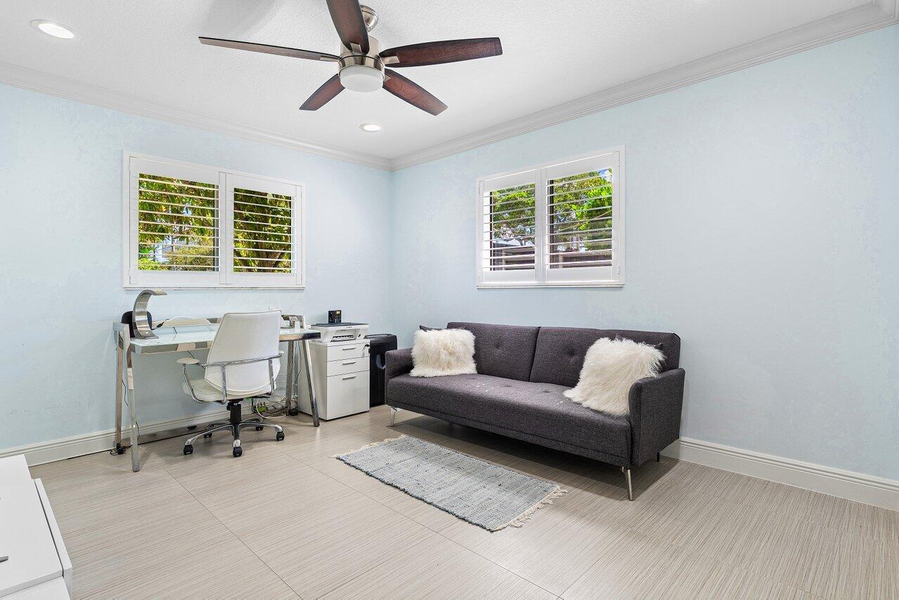 701 Buoy Road North Palm Beach, FL 33408 - Photo 27 of 52 a living room with furniture and a window