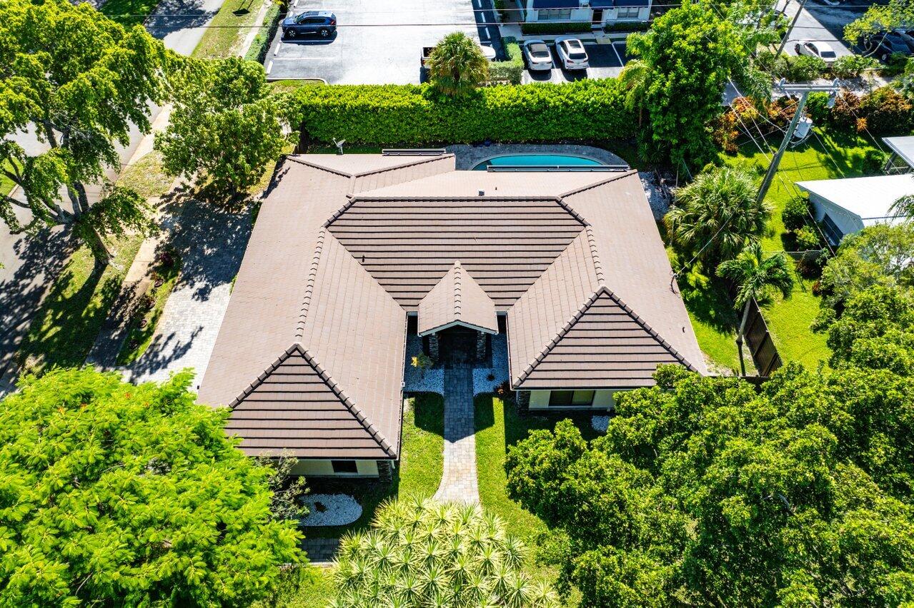 701 Buoy Road North Palm Beach, FL 33408 - Photo 41 of 52 a view of a house with a yard