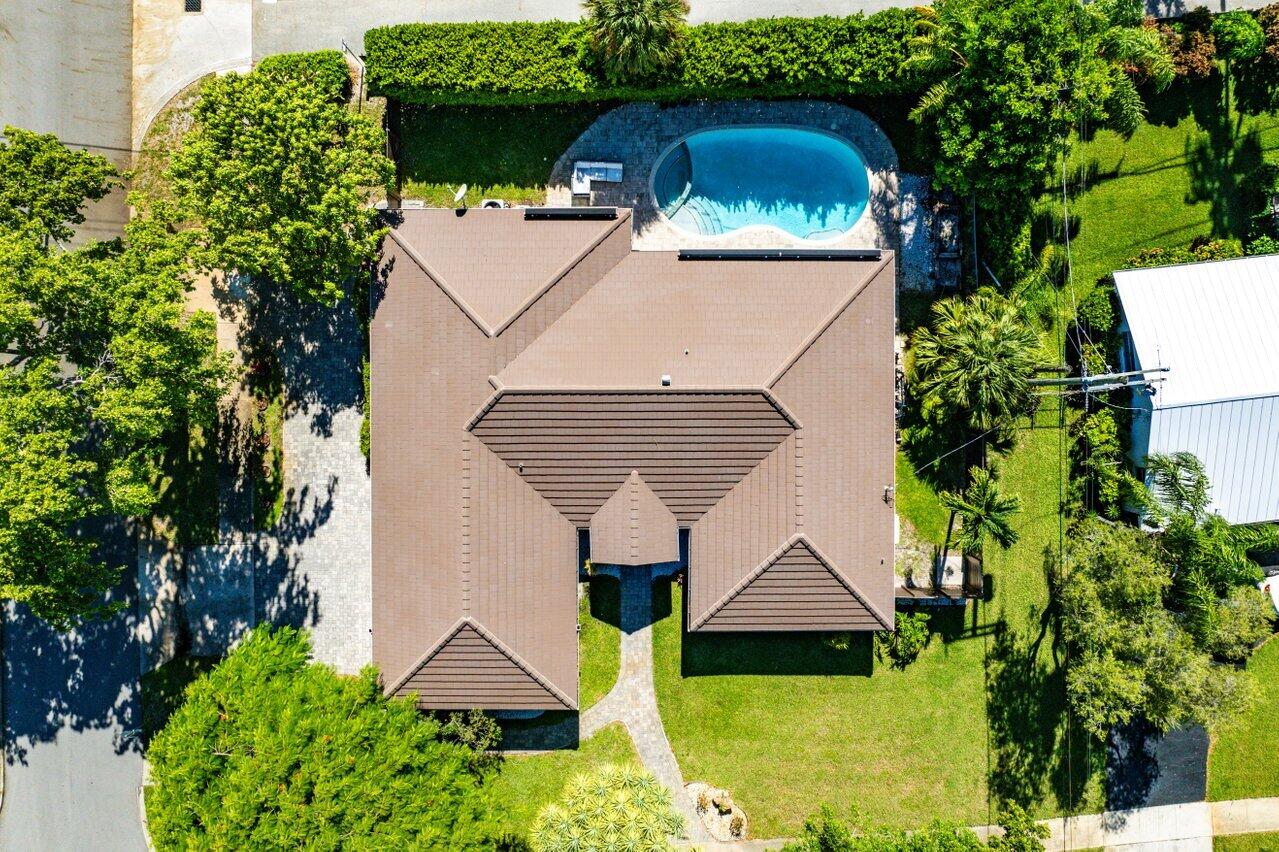 701 Buoy Road North Palm Beach, FL 33408 - Photo 43 of 52 an aerial view of houses with yard