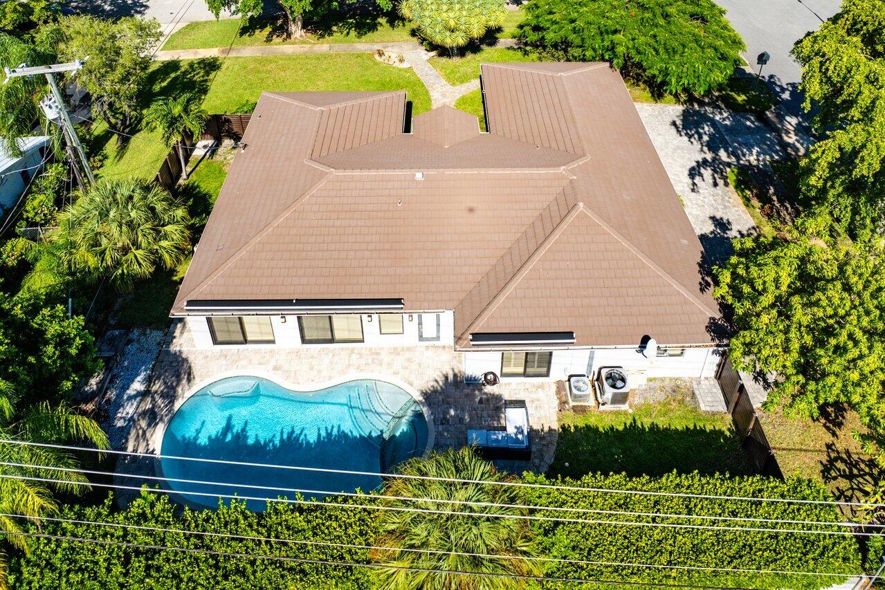 701 Buoy Road North Palm Beach, FL 33408 - Photo 44 of 52 an aerial view of a house with garden space and street view