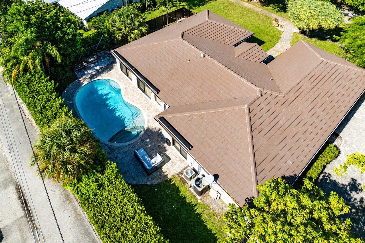 701 Buoy Road North Palm Beach, FL 33408 - Photo 46 of 52 a view of a backyard with plants