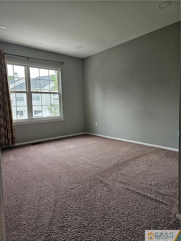 2403 Pheasant Run Monmouth Junction, NJ 08852 - Photo 17 of 36 an empty room with a empty space and a window