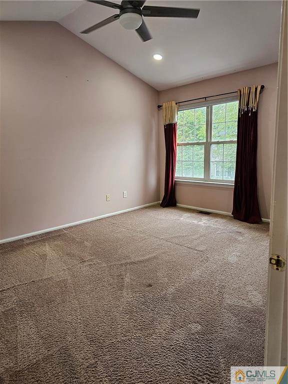 2403 Pheasant Run Monmouth Junction, NJ 08852 - Photo 18 of 36 a view of an empty room with a window