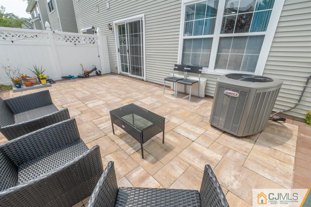 2403 Pheasant Run Monmouth Junction, NJ 08852 - Photo 34 of 36 a outdoor space with patio furniture