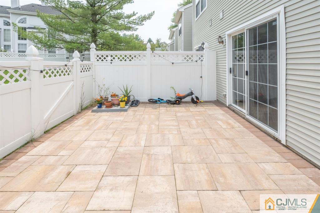 2403 Pheasant Run Monmouth Junction, NJ 08852 - Photo 35 of 36 a view of a terrace with white walls