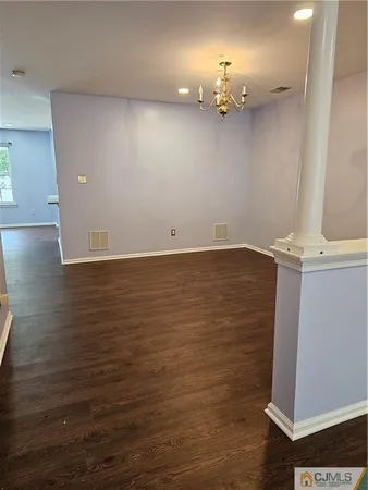 an empty room with a bathroom