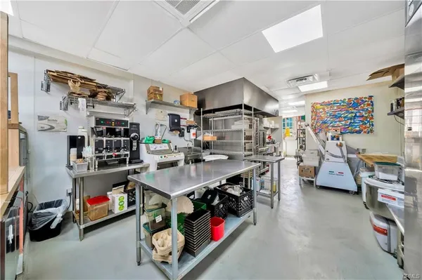 an aerial view of residential house with an outdoor space