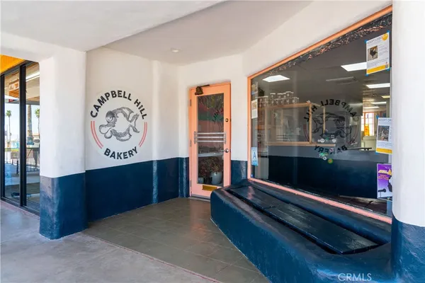 a room with furniture and window