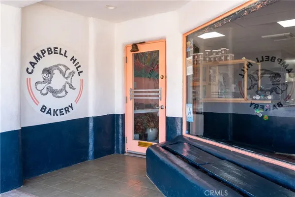 a view of a living room with furniture