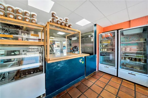 a view of a room with shelves