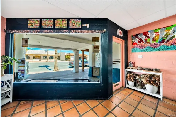 a kitchen with stainless steel appliances granite countertop a stove and a refrigerator