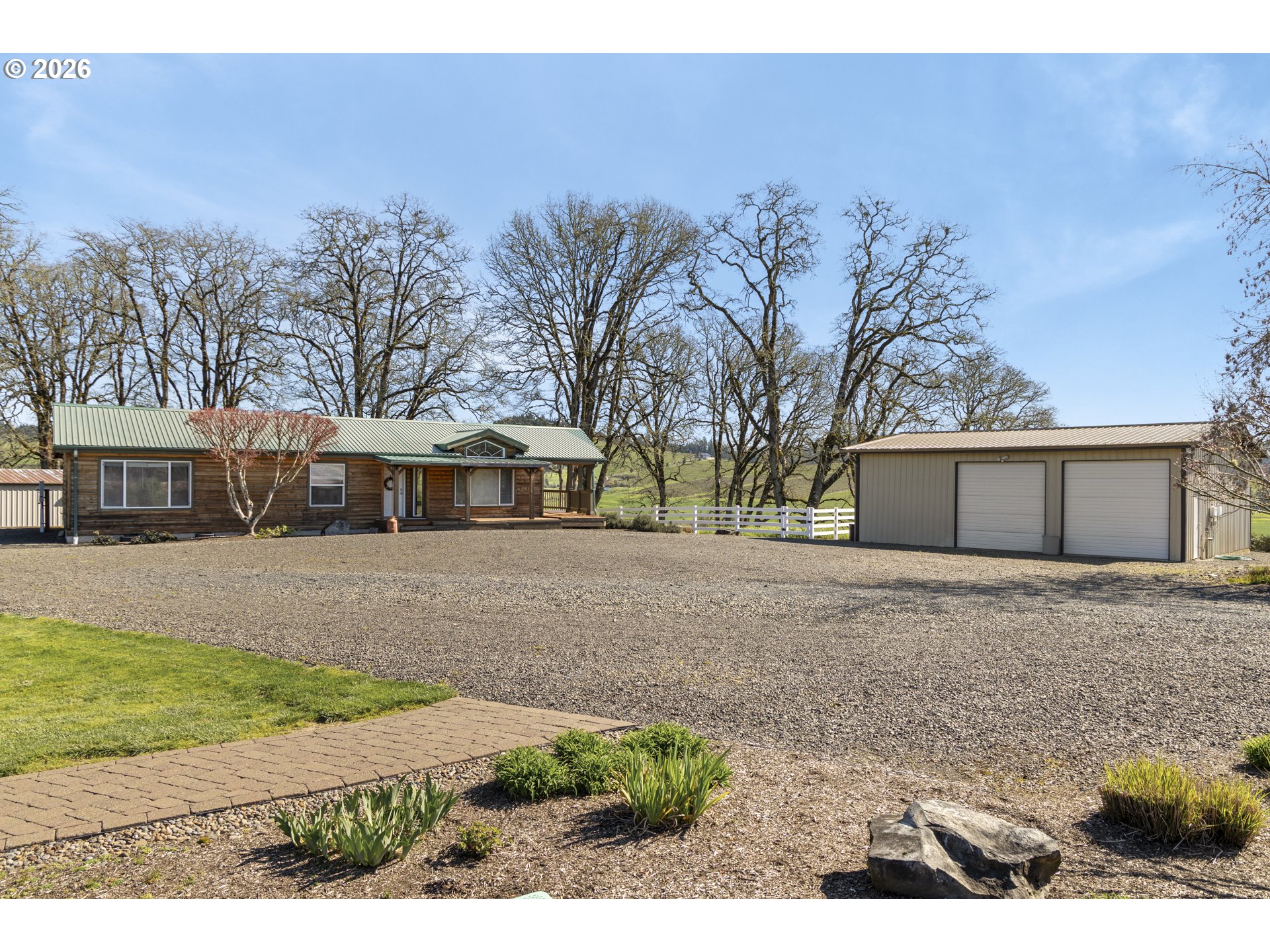 17795 Northeast Laughlin Road Yamhill, OR 97148 - Photo 40 of 48 a front view of a house with a yard and trees
